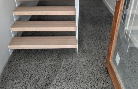 Polished concrete floor around entry to Brisbane building