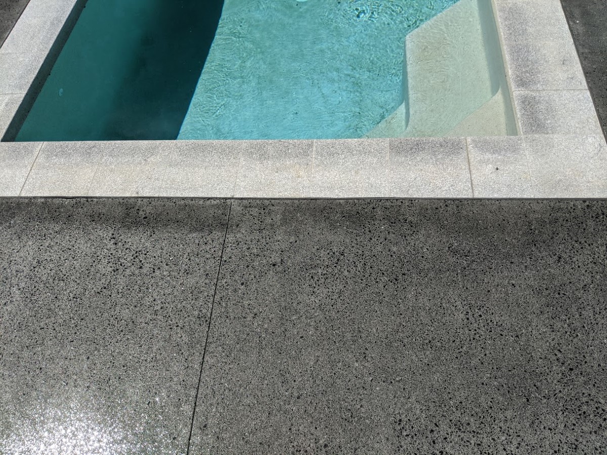 Concrete grinding around pool