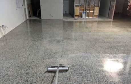 Applying polished concrete sealer Brisbane