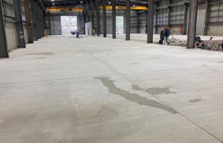 Repairing concrete floor inside Brisbane warehouse
